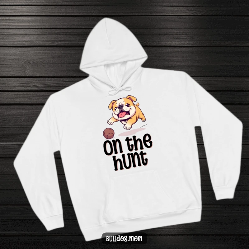 Funny Kawaii Bulldog hoodie, featuring a comical waddle, eyes locked on a rolling ball, embodying pure, funny canine determination.