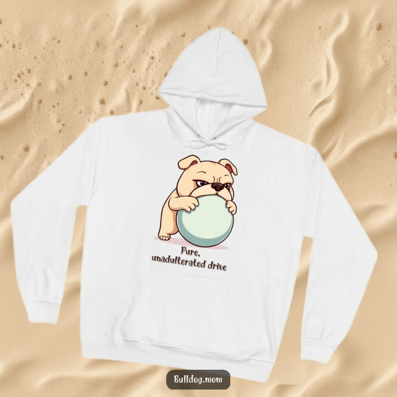 Funny hoodie showcasing a bulldog with a determined look, powerfully pushing a large ball, embodying strength and focus.
