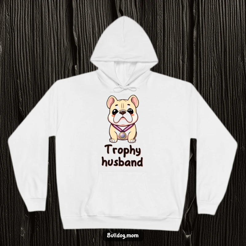 Funny hoodie featuring a proud bulldog victoriously holding a shiny medal, exuding confidence and charm.