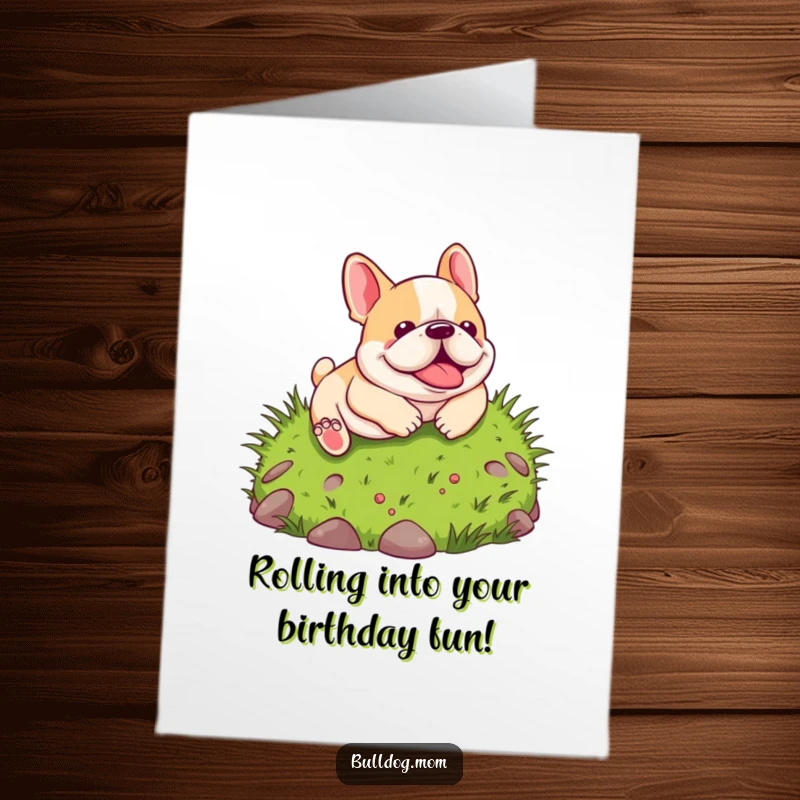 Funny Free Printable Birthday Card: Kawaii bulldog joyfully rolling down a green grassy hill, pure happiness.
